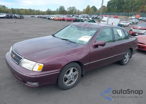 1999 Toyota Avalon Xls z USA, uszkodzony, nr VIN 4T1BF18BXXU299725